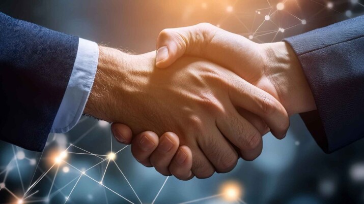 Two men shaking hands to show strong partnership and representing strong security.